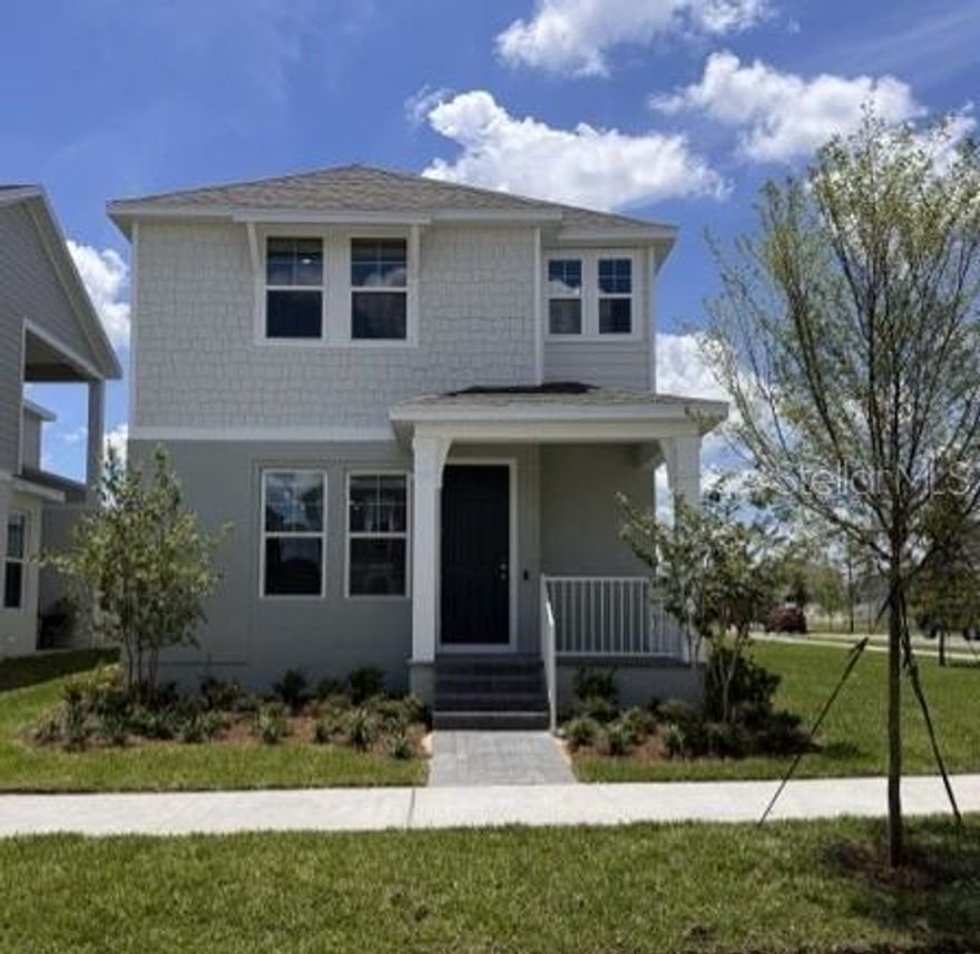 Discover the spacious Vista plan at Cypress Bluff – the largest 2-story home in our Bungalow series with a large Primary Bedroom, a 1st floor Guest Suite, and situated on a beautiful oversized corner homesite! This beautifully designed 4-bedroom, 3-bath home offers thoughtful features and modern finishes. The open-concept layout offers a first-floor guest bedroom with an adjacent full bath, ideal for visitors or multigenerational living. Enjoy soaring 9'4" ceilings on the 1st floor, 9' ceilings on the 2nd floor, and a versatile second-floor loft - perfect for a media room or home office. The stylish kitchen features 42" upgraded cabinets with crown molding, quartz countertops, a sleek tile backsplash, and center island for plenty of prep space. The adjoining dining area opens to a charming side covered porch, ideal for outdoor living and entertaining. Future Community amenities include a beautiful Pool overlooking Lake Lucy, Cabana, walking trails, and 2 Playgrounds, with future shopping and retail within the Community. Cypress Bluff offers quick access to the Florida Turnpike, and conveniently located just minutes from downtown Groveland and Clermont.