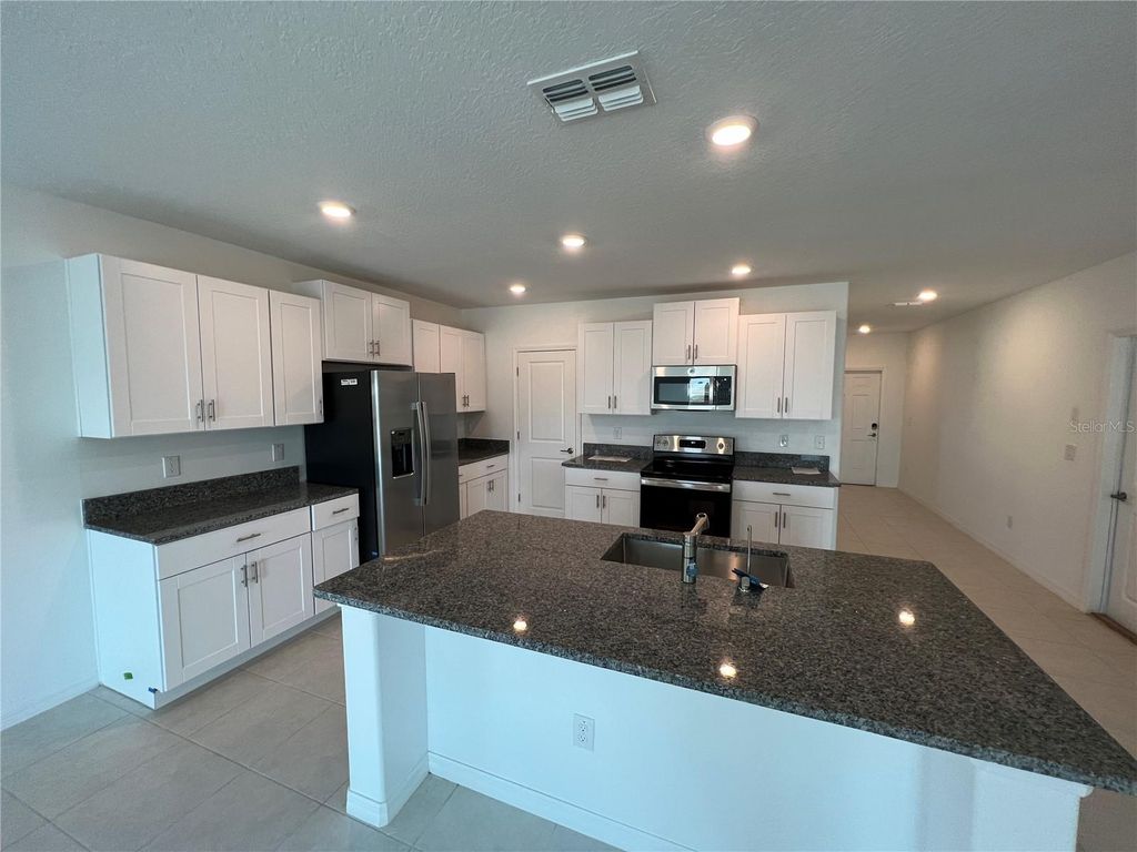 Photo of 9825 Branching Ship Trace, Wesley Chapel, FL 33545 (MLS # TB8492823)