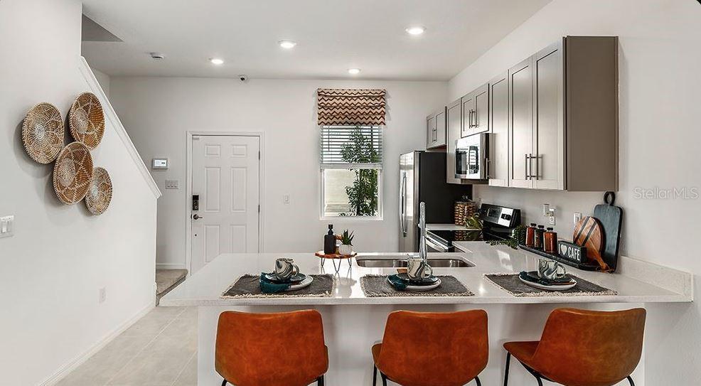 TOWNHOMES AT AZARIO - Residential