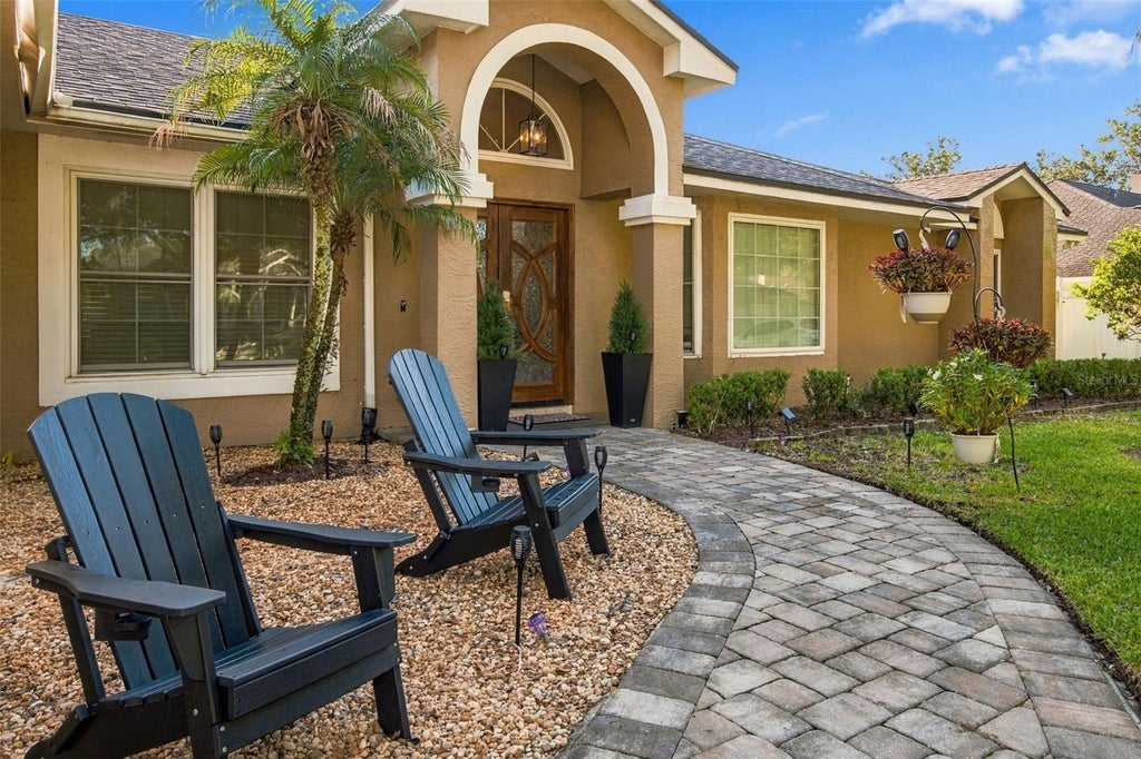 Photo of 7709 Apple Tree Circle, Orlando, FL 32819 (MLS # O6451572)