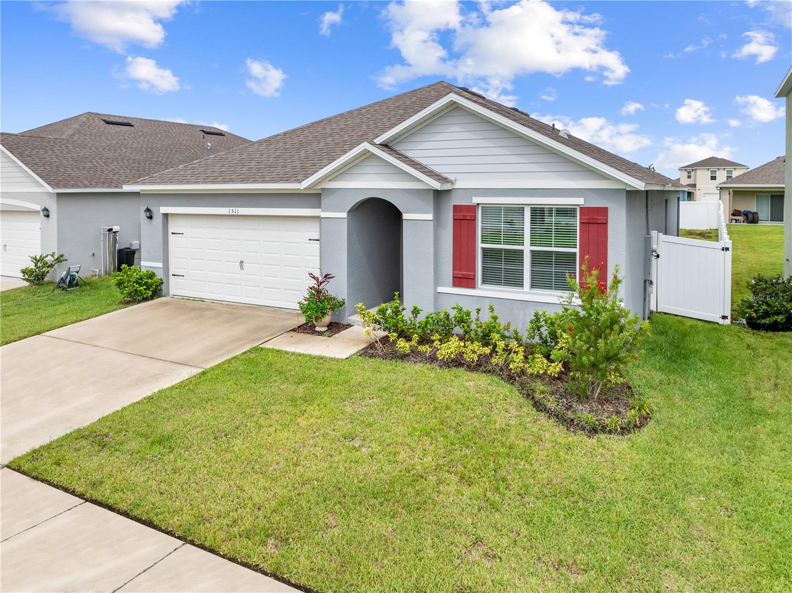 Experience the perfect blend of style, comfort, and convenience in this modern 3-bedroom home, built in 2022 and nestled in the highly sought-after Kindred community in Kissimmee. Designed with functionality and everyday living in mind, this move-in ready property offers a bright, open-concept floor plan, complete with durable tile flooring in the main living areas and plush carpeting in the bedrooms.
At the heart of the home is a stunning kitchen equipped with stainless steel appliances, granite countertops, a spacious walk-in pantry, and a large center island with a breakfast bar — ideal for casual dining and entertaining alike. Natural light pours through energy-efficient double-pane windows, highlighting a fresh color scheme and unique accent walls throughout.
Enjoy Florida living at its best on the screened lanai, overlooking a fully fenced backyard—perfect for privacy, play, pets, or gardening. The split-bedroom layout offers optimal privacy with a generous primary suite featuring a walk-in closet and en-suite bath, while two additional bedrooms share a full bathroom on the opposite side of the home.
As a resident of Kindred, you'll have access to resort-style amenities including a sparkling pool, fitness center, tennis and volleyball courts, playgrounds, and more — everything you need for fun and relaxation just steps from your front door.
Located just off Kings Highway, you’ll enjoy easy access to Lake Toho, Downtown Kissimmee, St. Cloud, major highways, theme parks, shopping, dining, and top local attractions.
Don’t miss the opportunity to own this beautifully designed home in a thriving community — schedule your private showing today!