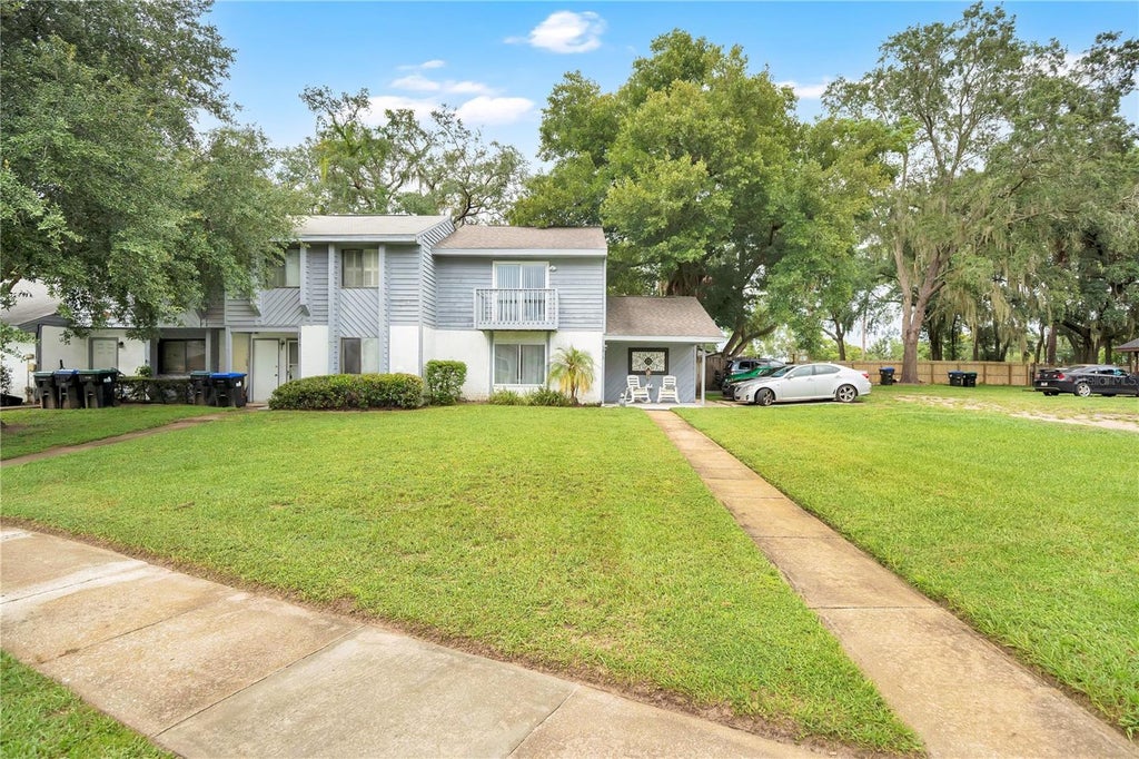 Photo of 3913 Magnolia Pointe Lane, Orlando, FL 32810 (MLS # O6442359)