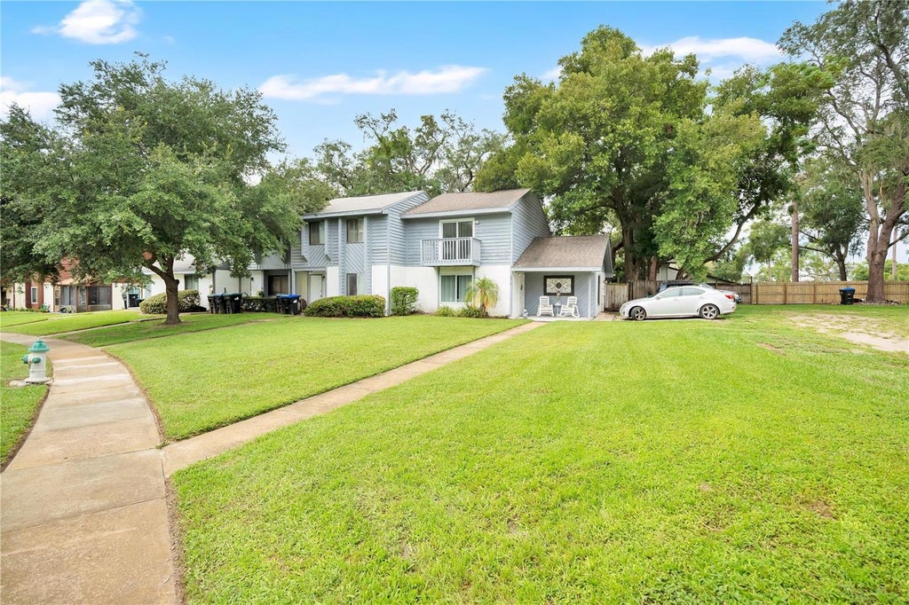 Photo of 3913 Magnolia Pointe Lane, Orlando, FL 32810 (MLS # O6442359)