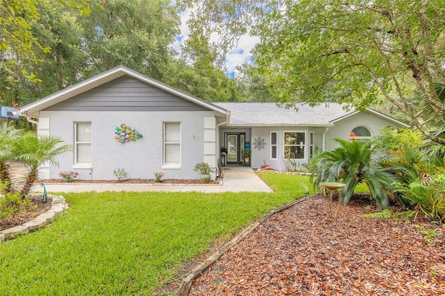 Hidden gem in Port Orange! This well-maintained pool home sits on nearly ½ acre with no HOA, offering space, privacy, and freedom rarely found this close to everything. Step inside and enjoy the openness created by vaulted ceilings and a spacious floor plan with a separate dining room perfect for gatherings. The kitchen overlooks the living room and features abundant cabinet space along with a convenient built-in desk tucked away in the corner. This versatile floor plan offers multiple options — the game room can easily become a 5th bedroom by adding a closet, or the Florida room can serve as a 4th bedroom, office, or flex space to fit your needs. Outside, you'll discover your own private retreat. The screened-in inground pool and covered patio area provide plenty of room to relax, entertain, and even enjoy outdoor barbecues on rainy Florida afternoons. The expansive backyard creates a peaceful setting that truly feels like your own oasis. Additional features include a durable slate roof, transferable termite bond, solid construction, and a high-and-dry location. Conveniently located near Port Orange’s award-winning schools, shopping, beaches, and interstate access, this home offers the perfect balance of privacy and convenience. Schedule your private showing today.