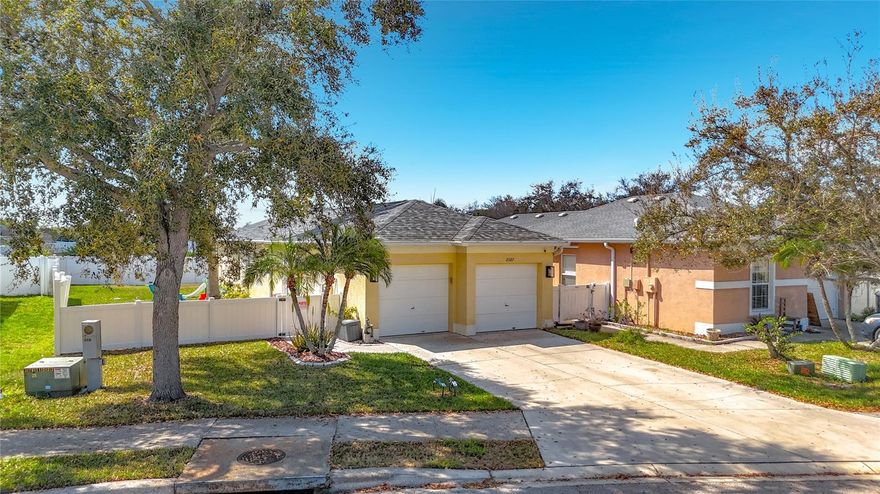 This meticulously maintained 3BR/2BA/2CG home offers the ultimate "Triple Threat" of value: unbeatable financing, massive structural upgrades, and a prime location.

Take advantage of an assumable loan at a rare 4.75% interest rate, or enjoy 100% financing ($0 down) via USDA eligibility. A lease-option is also available, providing unmatched flexibility for any buyer.

Enjoy total peace of mind with a brand-new 2024 roof and 2024 high-impact windows, both featuring transferable warranties. The interior shines with new 2025 flooring throughout and a dedicated laundry room with 2025 custom cabinetry. While the kitchen and baths retain their original, impeccably clean cabinetry and countertops, they are complemented by a 2024 stainless appliance package and 2025 washer/dryer.

The primary suite features custom built-ins in the walk-in closet, and the private backyard is fully enclosed by a 2023 vinyl fence. Perfectly situated in a non-flood zone with no CDD and a low HOA, this home is located directly adjacent to guest parking and the community playground. Move in today and enjoy a turn-key home that is ready for your personal touch!