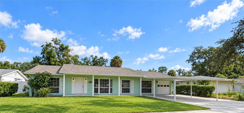 Photo of 8013 W Elm Street, Tampa, FL 33615 (MLS # TB8549056)