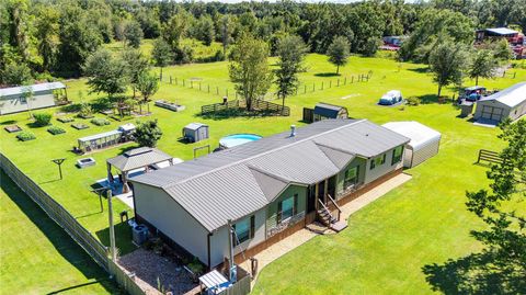 Photo of 2083 Sr 50, Webster, FL 33597 (MLS # TB8437034)