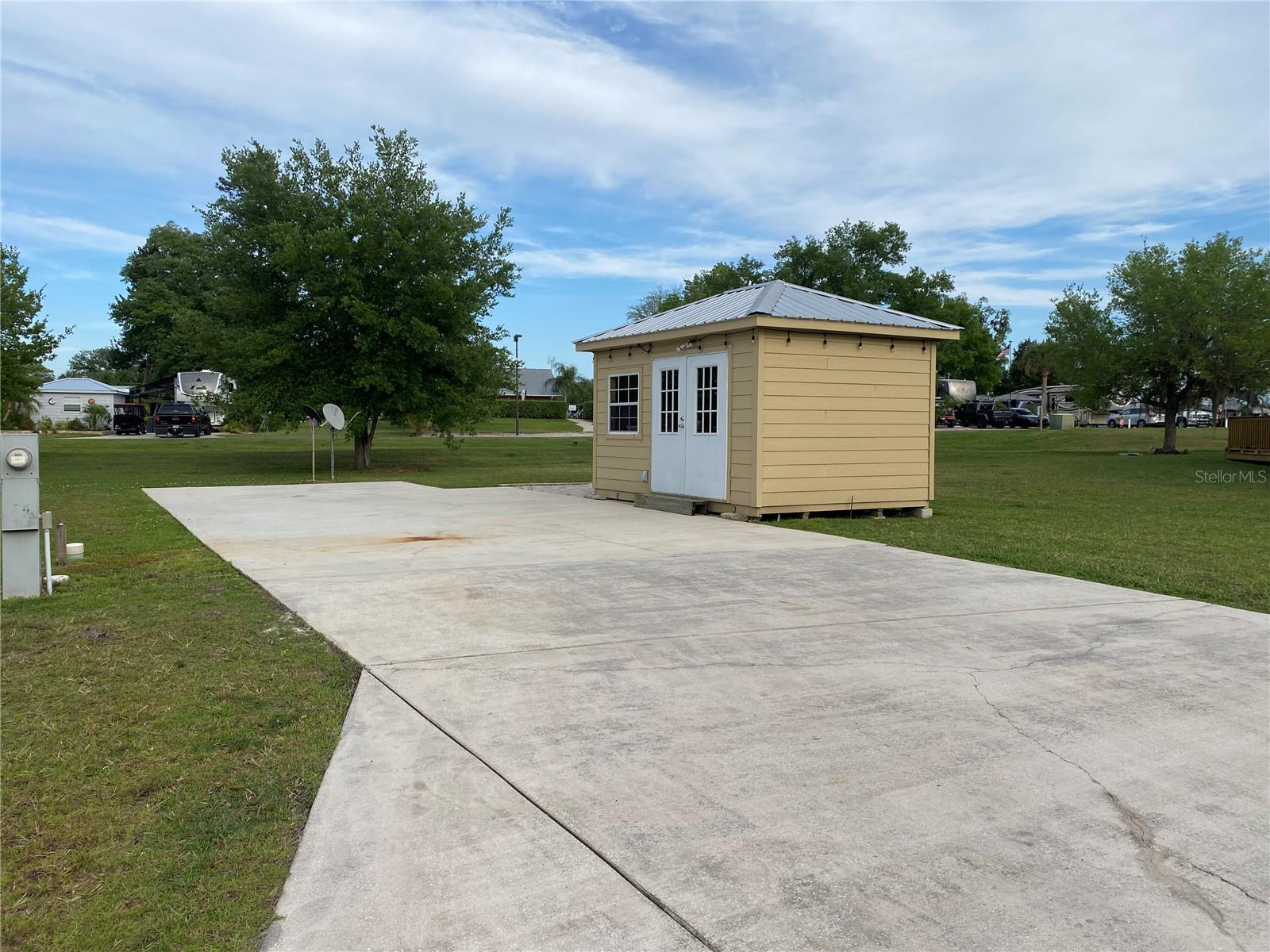 Nestled with the Wilderness RV Park sits the Preserve Estates, a premier 55+ gated RV community. Enjoy the Florida sunshine, peace and serenity of nature. This desirable RV lot comes with a shed which has electricity and a paver patio. One of best features of this lot is how spacious it feels. Due to the shallow swale behind the lot, you will never have any rear neighbors. Feel immersed in nature and walk to the Ocklawaha River where you can kayak and fish. Community amenities abound with your own clubhouse, heated pool, hot tub, fitness center, shuffleboard and Greenway hiking trails. Located just outside Ocala, you will be minutes from Silver Springs State Park, shopping, restaurants, historic downtown Ocala and approximately 1 hour to Ormond Beach. Please note that you own the land and the lot is deeded in your name. HOA fee includes road maintenance, water, sewer, trash and lawn care.