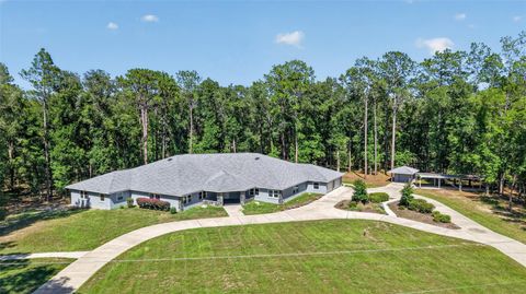 Photo of 7705 SW 186 Avenue, Dunnellon, FL 34432 (MLS # OM727171)