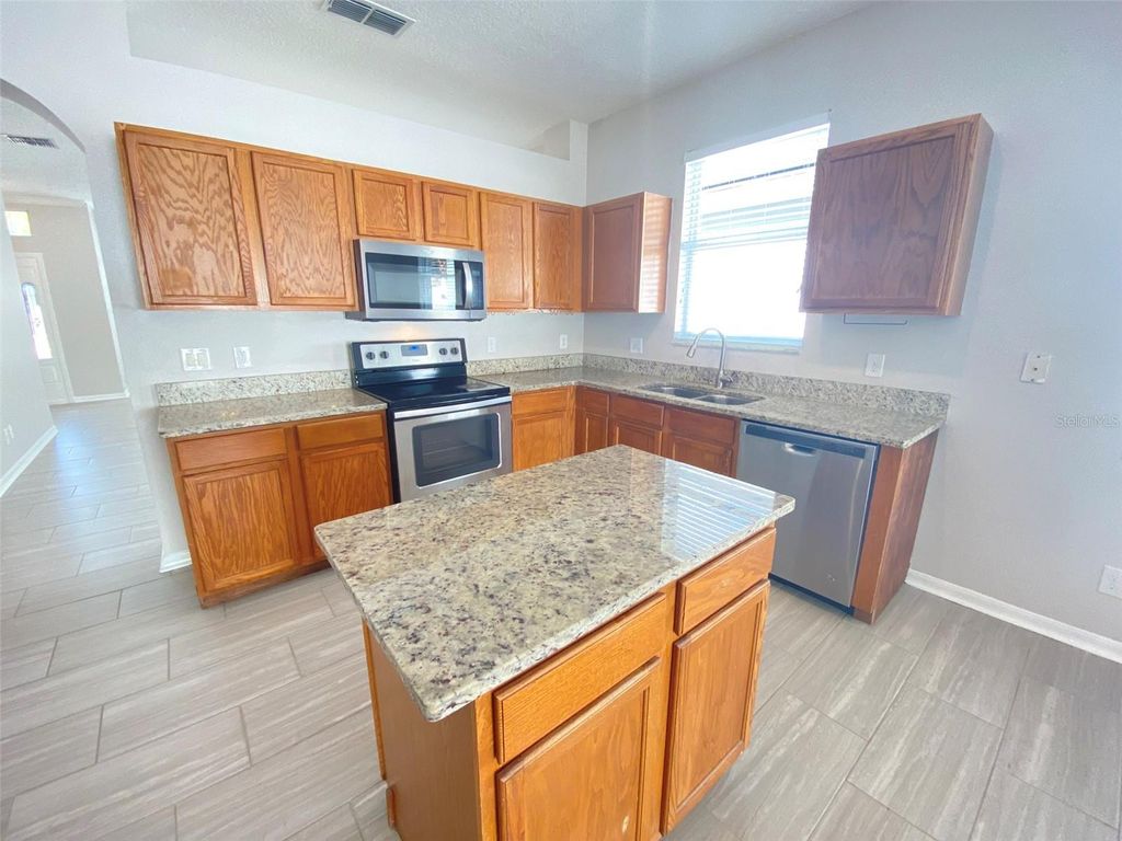 Photo of 1737 Lalique Lane, Orlando, FL 32828 (MLS # O6380493)