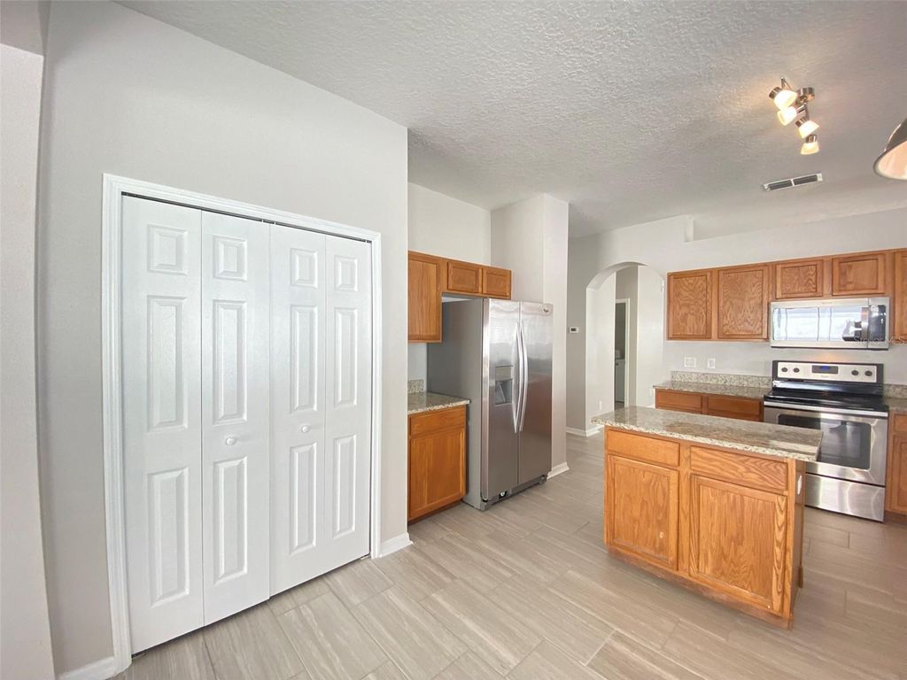 Photo of 1737 Lalique Lane, Orlando, FL 32828 (MLS # O6380493)