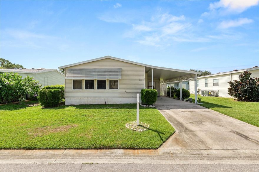 Take a look at this 2 bedroom 2 bathroom home located in the guard gated 55+ community of Cypress Lakes. This home features indoor laundry, and a utility room with washer dryer hooks up if you prefer. There is a 1 car carport and outdoor storage room. The home has a front all seasons room to add additional living space. There is a living room and a dinette located off the kitchen. The primary suite is extra spacious with extra sitting room, multiple closets and the bathroom has a stand up shower. The 2nd bathroom is also extra large with a sitting room, double closets and the washer/dryer. The 2nd bathroom features a tub/shower combo. Enjoy this very active community with amenities including a community pool, pickle ball, tennis and shuffleboard courts as well as a clubhouse and restaurant. Schedule your private showing today!