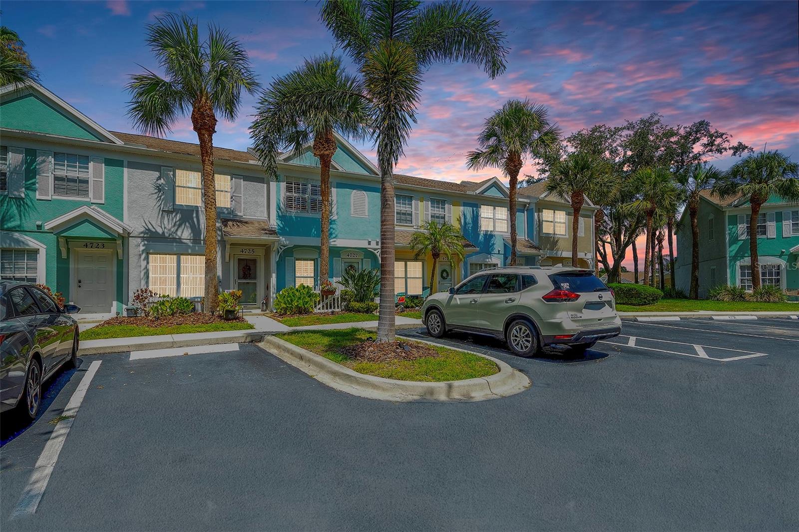 Stunning Renovated Townhome in Gated Sabal Harbour – Lake Views & High-End Finishes. This completely renovated 2-bedroom, 2.5-bath townhome in the highly desirable, gated community of Sabal Harbour offers a rare combination of style, comfort, and location. Nestled on a serene, tree-lined circle at the back of the community, this home provides peaceful lake views and a true sense of privacy. Every detail has been thoughtfully upgraded, starting with the gourmet kitchen—featuring 48" custom shaker wood cabinetry, quartz countertops, subway tile backsplash, under-cabinet lighting, a custom bar and beverage station with fridge, farmhouse sink, stainless steel appliances, recessed lighting, and garbage disposal. All bathrooms have been completely renovated with new vanities, mirrors, toilets, and refinished tubs, plus updated plumbing and stylish barn doors. The entire home boasts luxury vinyl plank flooring throughout—including stairs—5" baseboards, new light fixtures and ceiling fans in the living room, lanai, and primary suite. Additional highlights include: 2023 New HVAC system with Nest thermostat; Plantation shutters with aluminum core (warp-resistant); Fresh interior paint, upgraded interior hardware, and storm door lanai rescreened, patio slider rollers replaced. New laundry valves, dryer vent hose, and vent cleaned (2024); Hardwired exterior lighting with timer & weather protection; Ring doorbell, new front door hardware, and push-button entry. Custom under-stair storage access. Decorative landscaping with river rock seating areas (front & back). Roof replaced (2019), exterior paint (2021) – HOA maintained. Sabal Harbour is a resort-style community offering a clubhouse, heated pool, tennis & pickleball courts, volleyball & basketball courts, and a playground. HOA fees are low and include water, sewer, and trash. NO rental restrictions, NO flood insurance required, making it perfect for investors or second-home seekers. Conveniently located near Lakewood Ranch, downtown Bradenton Riverwalk, UTC Mall, Ellenton Outlets, medical centers, restaurants, and just a short drive to award-winning Gulf Coast beaches. Experience the charm of this Vintage-Inspired Coastal Farmhouse—an opportunity you don’t want to miss!