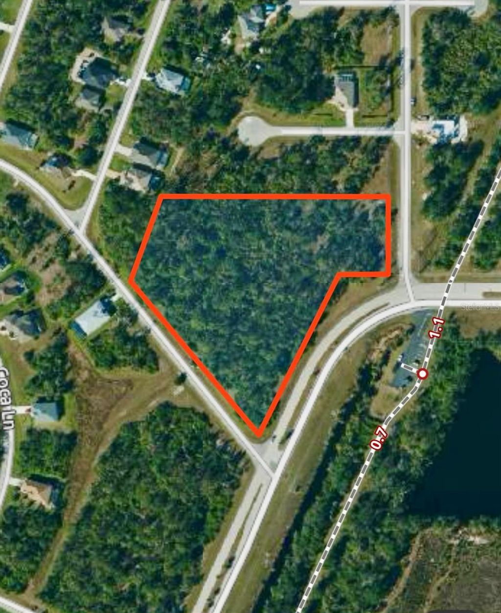 Photo of 102 Antilla Drive, Rotonda West, FL 33947 (MLS # N6141372)