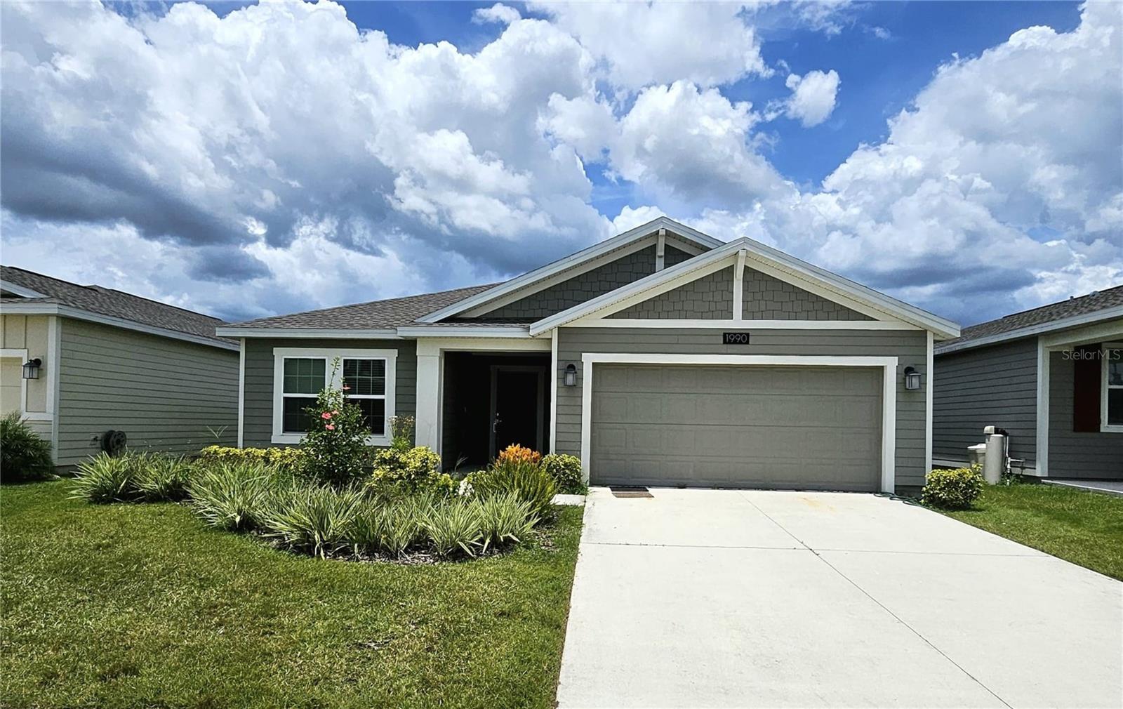 Welcome to this beautiful, single-family home located in the desirable Storey Creek Community in Kissimmee. This one-story, open-concept home offers four spacious bedrooms, two bathrooms, a two-car garage, and a large backyard. Enjoy premium features including quartz countertops, tile flooring throughout (with carpet in the bedrooms), LED ceiling fixtures, ceiling fans, window blinds in every room, stainless steel kitchen appliances, and a washer and dryer. Conveniently located near Disney Theme Parks, the airport, and major Florida highways like SR 535, I-4, and US 192, this home provides easy access to all your needs. The Storey Creek community amenities feature a fully equipped fitness center, clubhouse, resort-style pool, tennis courts, playground, and more. Schools are walking distance, and shopping essentials like Home Depot, Publix, CVS, Walgreens, and various banks are just minutes away. Lawn care is included in the rent. Move-in ready, experience low-maintenance Florida living! Don’t miss this opportunity!