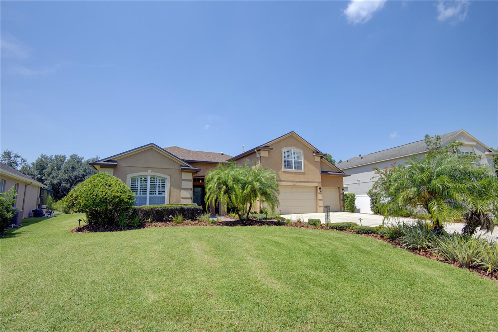 Discover the perfect blend of elegance and comfort in this beautifully upgraded pool home on an oversized lot within the guard-gated Preserve at Northwood in Eastwood. Designed for both everyday living and effortless entertaining, the heart of the home opens to an inviting outdoor retreat with a wood plank ceiling, stone-faced gas fireplace, outdoor kitchen, and a sparkling pool and spa framed by tranquil conservation views—all seamlessly connected to the family room through a stacking slider. The custom gourmet kitchen impresses with 42” cabinets, double oven, gas cooktop, and a generous center island with second sink, while the owner’s suite offers peaceful views of the pool and pond along with a spa-style bath featuring dual vanities, soaking tub, and tiled shower. A private study, three spacious guest bedrooms, and an upstairs bonus room provide exceptional flexibility, whether for additional bedrooms, a media room, or home office. With a 2019 roof, fully paid Tesla solar panels (electric bills averaging ~$30), redesigned landscaping, smart-home upgrades, and a 2024 outdoor kitchen refresh, this home combines timeless charm with modern efficiency. Eastwood residents enjoy A-rated schools, parks, tennis and basketball courts, playgrounds, and community pool—plus high-speed internet and cable included—all minutes from Waterford Lakes, UCF, and major roadways.