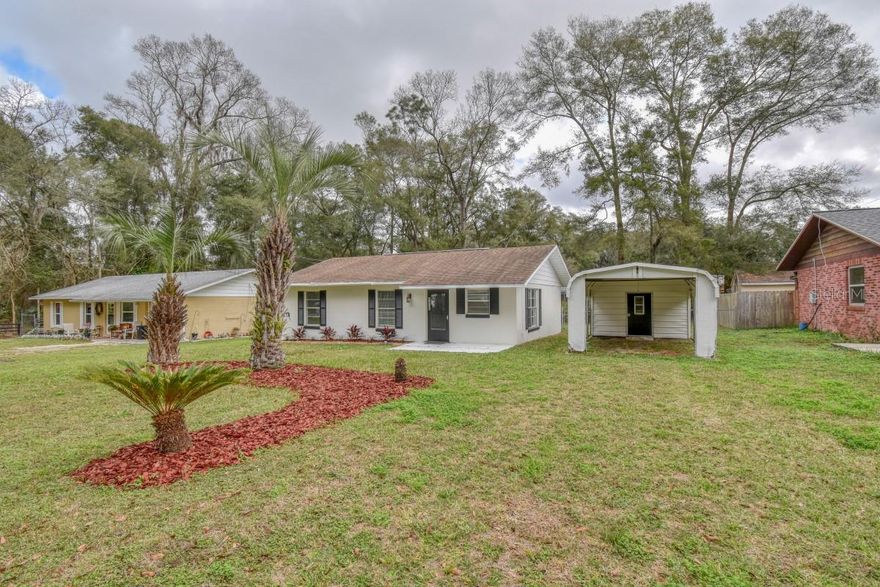 This is a home that you need to see to believe.Beautiful laminate flooring, new bathrooms, and freshly painted inside and out are just a few of the upgrades you'll find in this 3 bedroom ranch 2 bath. The kitchen boasts stainless steel appliances. 

This home is located on a quiet street in a great neighborhood and has everything you could possibly want: a large master bedroom with attached bathroom, washer/dryer area and large backyard. Carport with storage area and manicured landscaping.