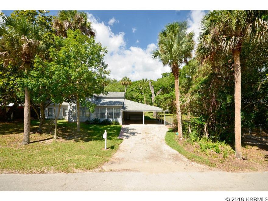 This historically charming home on an extra large lot with recent renovations is truly move-in ready! Features original hardwood flooring in excellent condition, wood-burning fireplace, gas appliances, mostly newer Low-E double-pane windows and indoor laundry room. Owner has added additional attic insulation to improve energy efficiency. Renovations include new carpet in two bedrooms, updated electric, new dishwasher and disposal, remodeled bathrooms and new sod with irrigation sprinklers in front yard. Dining room off Kitchen can count has 3rd bedroom, office or den. There is a mobile butcher block center island in the kitchen with optional electrical hookup that conveys with the sale. This home is strategically situated on a large lot with a huge backyard with 12â-wide gates on both side yards allowing plenty of access for RV or boat parking. Great location with nearby boat ramps, city parks & municipal sports complex and also not too far from the beaches of New Smyrna Beach and shopping of Port Orange. Offered As-Is. ;Water: City