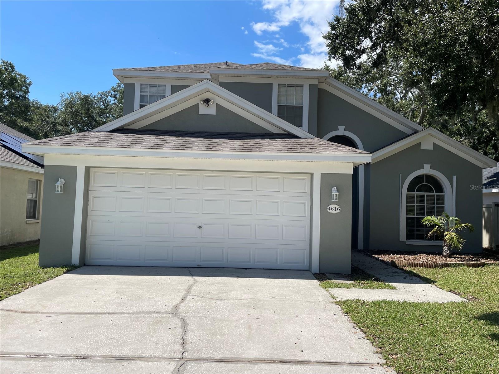Beautiful home on a spacious lot with no rear neighbors in the private, gated community of Whispering Oaks in Carrollwood partially furnished (may also be leased unfurnished)! This 4 bedroom, 2.5 bathroom, 2 car garage home is loaded with upgrades, welcoming you with its fresh, clean curb appeal and inviting front porch. Just off the entry is a formal office with double door entry. A door inside the officer leads you to the kitchen, making this an ideal flex room that can easily be used as a formal dining room, den, game room, or playroom. Beyond the entry is your open concept kitchen and kitchen cafe, which overlooks your large family room. Sliders just off the kitchen cafe lead you to the spacious, air-conditioned sunroom and adjacent lanai with screen enclosure. The backyard is fully fenced with gates on both sides of the home, providing a lovely, private & serene spot to relax at the end of your day. A convenient half bath for guests and a laundry room are also situated on the first floor. Your laundry room includes washer, dryer, and upper storage cabinets, as well as an access door leading to the garage. 3 secondary bedrooms are located upstairs, as well as a full bathroom featuring granite counters. AMAZING location in highly desired Carrollwood, with quick & easy access to Dale Mabry, I-275, the Veterans Expressway, and downtown Tampa. Tons of shopping, dining, Raymond James Stadium, & St. Joseph's Hospital located nearby, and less than 20 minutes from Busch Gardens & Adventure Island theme parks.