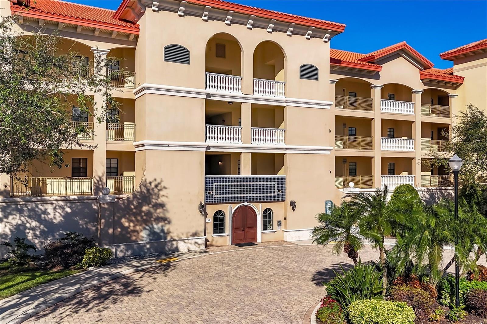 Welcome to your dream condo in the heart of Lakewood Ranch! This stunning 3-bedroom, 2.5-bathroom residence boasts over 1,700 square feet of luxurious living space, perfect for both comfort and style. As you step inside, you are greeted by an inviting foyer with vaulted ceilings and an open floor plan adorned with elegant luxury vinyl flooring in the bedrooms and beautiful ceramic tile in the main areas, creating a seamless flow throughout.
The spacious living area is perfect for entertaining or relaxing, while the well-appointed kitchen offers ample space and granite countertops, making meal preparation a delight. The generous laundry room adds convenience to your daily routine.
Enjoy peace of mind with hurricane impact windows that provide both safety and energy efficiency. The convenience of an elevator in the building allows for easy access to your unit. Step outside onto your private enclosed balcony, a serene oasis perfect for morning coffee or evening sunsets, where you can unwind and take in the beautiful surroundings.
The building features a new roof installed in 2022, ensuring durability and peace of mind. This amazing unit comes with one covered deeded parking space and extra storage. The community includes a clubhouse with a fitness center, a resort-style pool and spa, and a grill area by the pool, perfect for entertaining family and friends.
This condo is not just a home; it’s a lifestyle. Ideally located close to Lakewood Ranch Hospital and within minutes from Main Street Lakewood Ranch, you’ll have access to a vibrant community filled with activities, restaurants, and shops. With easy access to I-75 and just minutes from UTC Mall, this location is truly unbeatable. Don’t miss the opportunity to make this exquisite condo your own!