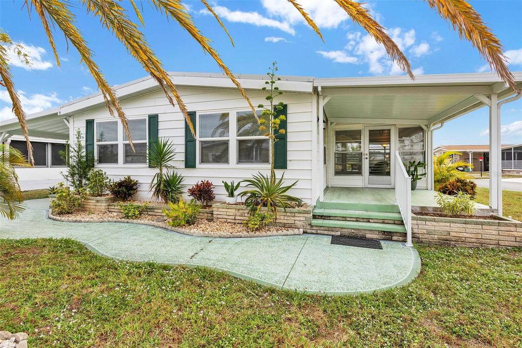 Photo of 329 La Costa, North Port, FL 34287 (MLS # TB8452795)