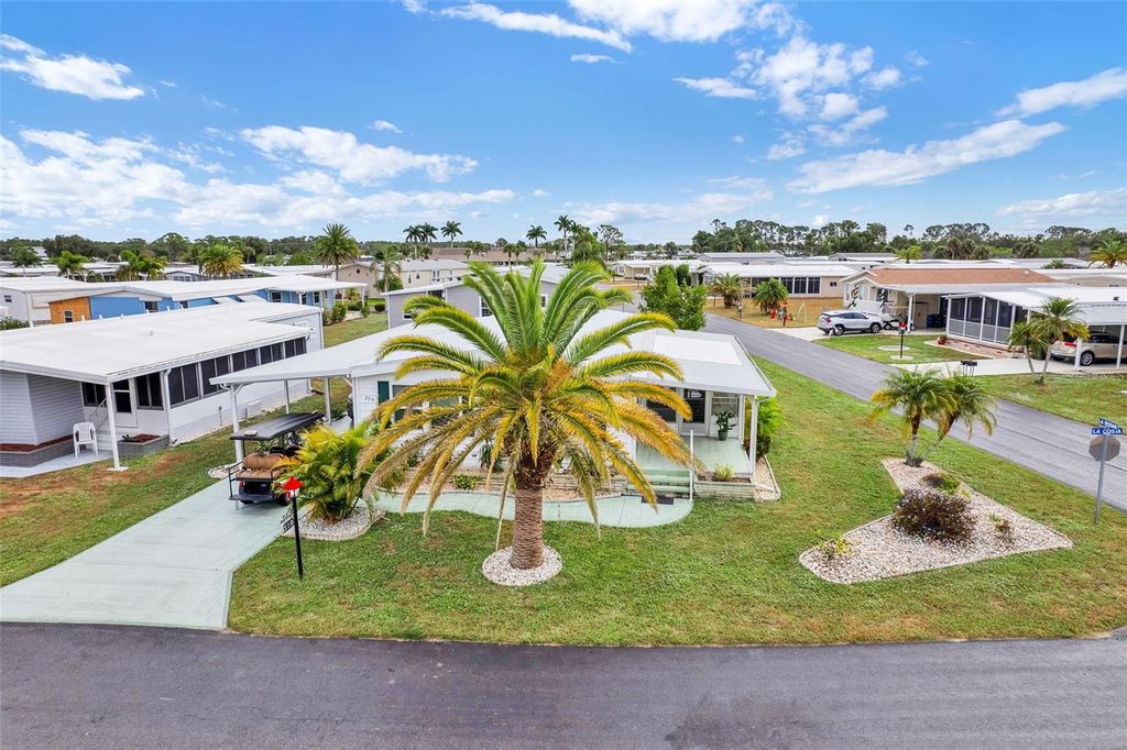 Photo of 329 La Costa, North Port, FL 34287 (MLS # TB8452795)