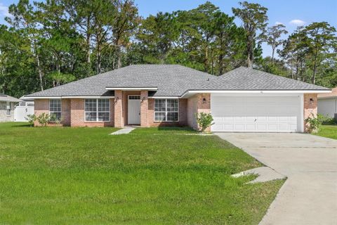 Photo of 46 Karat Path, Palm Coast, FL 32164 (MLS # FC314250)