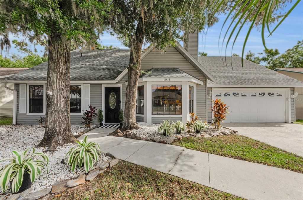 Photo of 1916 River Crossing Drive, Valrico, FL 33596 (MLS # TB8438474)