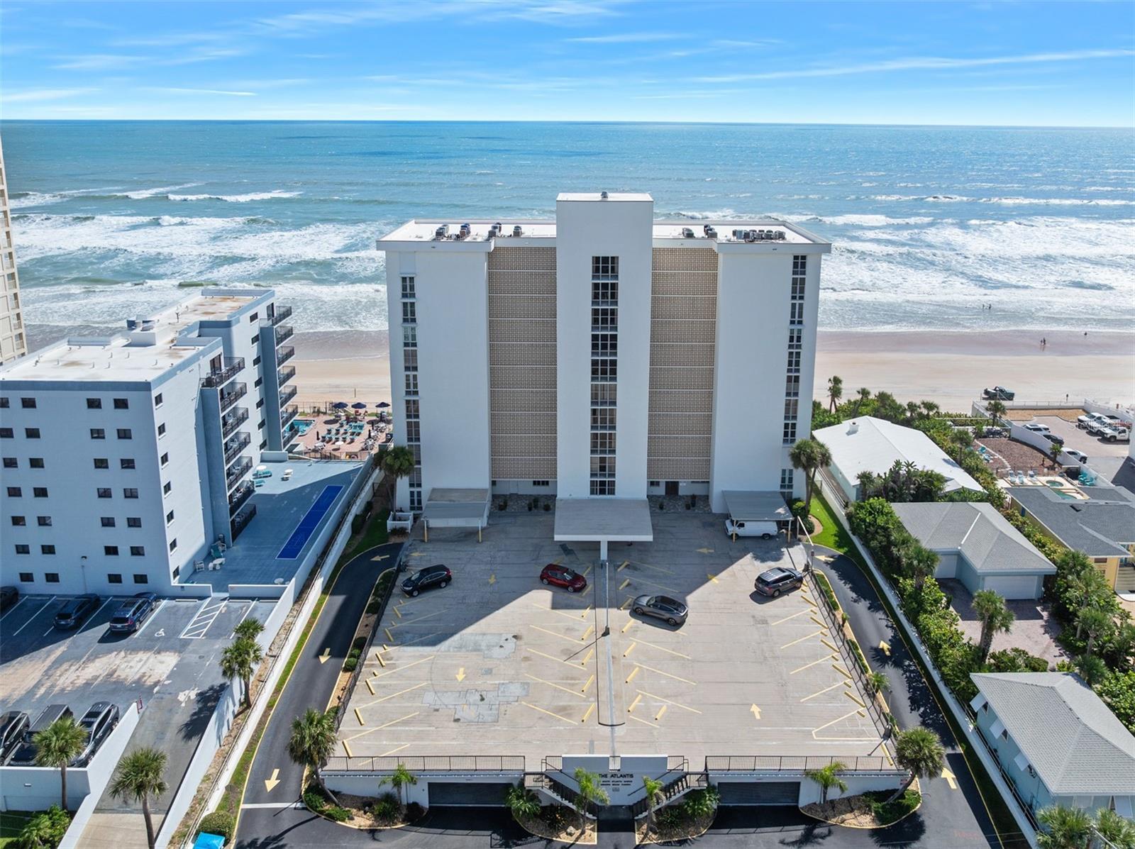 BEAUTIFUL FURNISHED TOP FLOOR | 180 degree OCEAN VIEWS | TURNKEY & RENOVATED
No pending assessments | All major building upgrades and inspections complete! Welcome to your peace of paradise on Ormond Beach! This beautifully updated and completely furnished 2-bedroom, 2-bath oceanfront condo is on the top floor, offering unobstructed 180-degree views of the Atlantic Ocean from the north, south, and east. It's move-in ready, bring your swimsuit! You'll be one of only three owners on the top floor. Enjoy sunrises and evening sea breezes, your private balcony is the perfect front-row seat to coastal living. Inside, you'll find a bright, open layout with tile flooring, a renovated kitchen featuring granite countertops, a stylish tile backsplash, and stainless steel appliances. The open dining area and spacious living room are ideal for entertaining. Additional features include: plantation shutters throughout, electric exterior roll-down hurricane shutters for ease and peace of mind, updated bathrooms and a spacious primary suite with direct balcony access. This well-maintained building offers a large oceanfront pool and gated beach access, making every day feel like a vacation. Recent Building Improvements Include: a new roof, new A/C, seawall & pool (2023), elevator modernization (2023) new building generator, upgraded parking deck & walkways. This is your chance to own a move-in ready beachfront retreat with no looming costs or projects. Schedule your showing today and start living the oceanfront lifestyle you’ve been dreaming of!