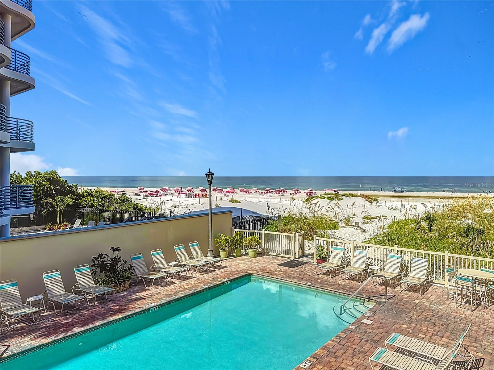 PERFECT VACATION HOME, INVESTMENT OPPORTUNITY, TURN KEY TOTALLY RENOVATED GULF VIEW CONDO WITH IMMEDIATE RENTAL INCOME. This is the sought after Boutique District of St Pete Beach, noted for relaxing, toes in the powdery sand and situated right on the sparkling waters of the Gulf of Mexico. This condo is light and airy, open floor plan, roomy kitchen with large breakfast bar, comfy primary bedroom with ensuite bath. Guest room is right next to 2nd bath and the in unit washer and dryer. From this beautifully updated condo enjoy morning coffee with a gulf view on your private balcony, come down to relax by the pool and jacuzzi, take a walk down the private path to the beach and enjoy applause worthy sunsets right from your vacation home. Shopping, dining and entertainment is all nearby and both airports are easily accessible from our interstate highway system. This condo is also one of the deeded parking space units, protecting your vehicle under the building and out of the elements. Vistas on the Gulf is a reinforced concrete and steel structure that is built on pylons and a 6 foot raised tract of beach front land. Recent weather and water had little effect on the building making this a secure investment. Refresh your spirit and renew your soul with this beautiful ownership opportunity on covetted Saint Pete Beach.