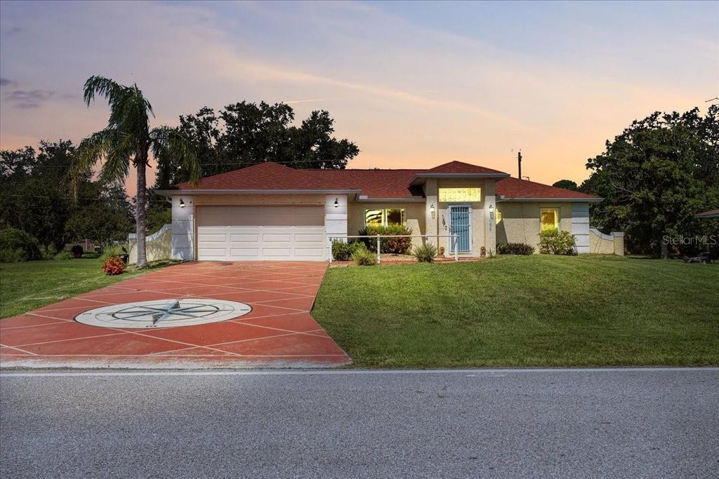 Photo of 3069 Pellam Boulevard, Port Charlotte, FL 33948 (MLS # C7513853)