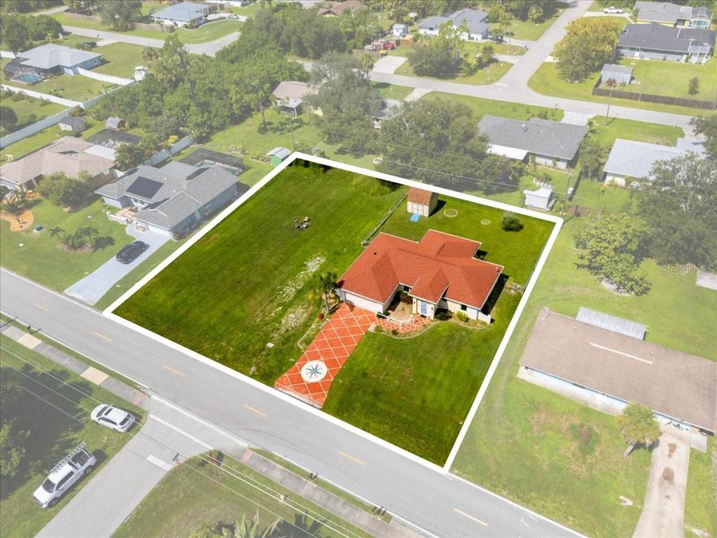 Photo of 3069 Pellam Boulevard, Port Charlotte, FL 33948 (MLS # C7513853)