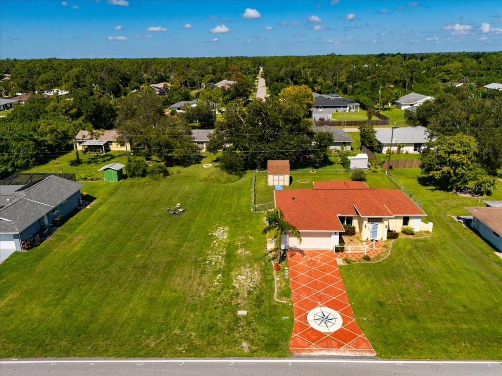 Photo of 3069 Pellam Boulevard, Port Charlotte, FL 33948 (MLS # C7513853)