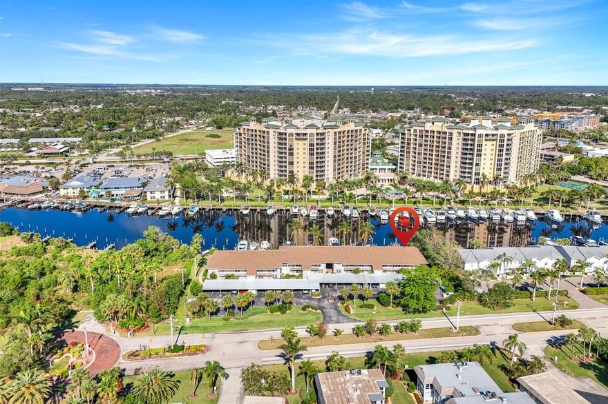 Boaters Dream location! Rarely available, Direct Gulf Access 1st floor end-unit with a 15x52 ft private boat slip! This 2 bed/2 bath condo was updated in 2023 (except bathroom showers/tub). A/C new 2023, Impact windows & sliding doors new 2019, Hot water heater new 2018. Beautiful Quartz countertops in kitchen and baths, stainless steel appliances and Tile floors throughout (no carpet here). Screened lanai features tile flooring and roll down shutters. This 18-unit community is located directly across the wide basin from the Luxury North Star Yacht Club and features an inground pool with water views and barbeque grills on the side of each building. Condo fees include cable, internet, water & sewer, Homeowner's & Flood insurance. 1 detached carport per unit. Quick and easy access to Downtown Fort Myers and entertainment, nearby shopping & dining. Check out this beautiful condo today!