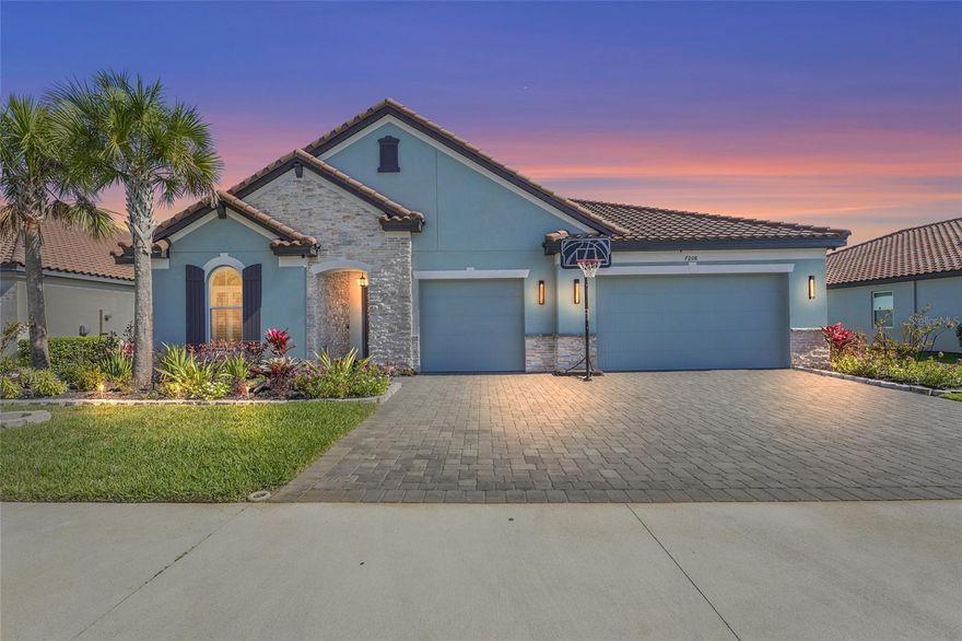 Better than new and built in 2022, this ENERGY STAR® certified custom Ashwood II in the gated community of Heron Landing offers the perfect blend of space, style, and efficiency, with serene east facing lake views and top of the line upgrades throughout.

The main living areas feature 32x32 marble look tile, a custom stone fireplace, and a showpiece kitchen with a waterfall quartz island. The primary suite is a true retreat with a spa like bath, waterfall quartz vanity, and floor to ceiling tiled showers. Flexible living spaces include a den, loft, and a custom dining room included with the purchase. Plantation shutters and solar shades on the sliders add style and everyday functionality.

Step outside to enjoy lake views and a backyard ready for seamless indoor outdoor living, complete with a private pool bath. The 3 car garage with epoxy coated floors and additional custom finishes make this home truly move in ready.

Located in a private, gated community of just 95 homes, you will enjoy privacy and tranquility while being minutes from Siesta Key Beach, Downtown Sarasota, Palmer Ranch, Lakewood Ranch, shopping, dining, and top rated schools.

Homes with this level of design, upgrades, and location do not come around often, so schedule your showing today.