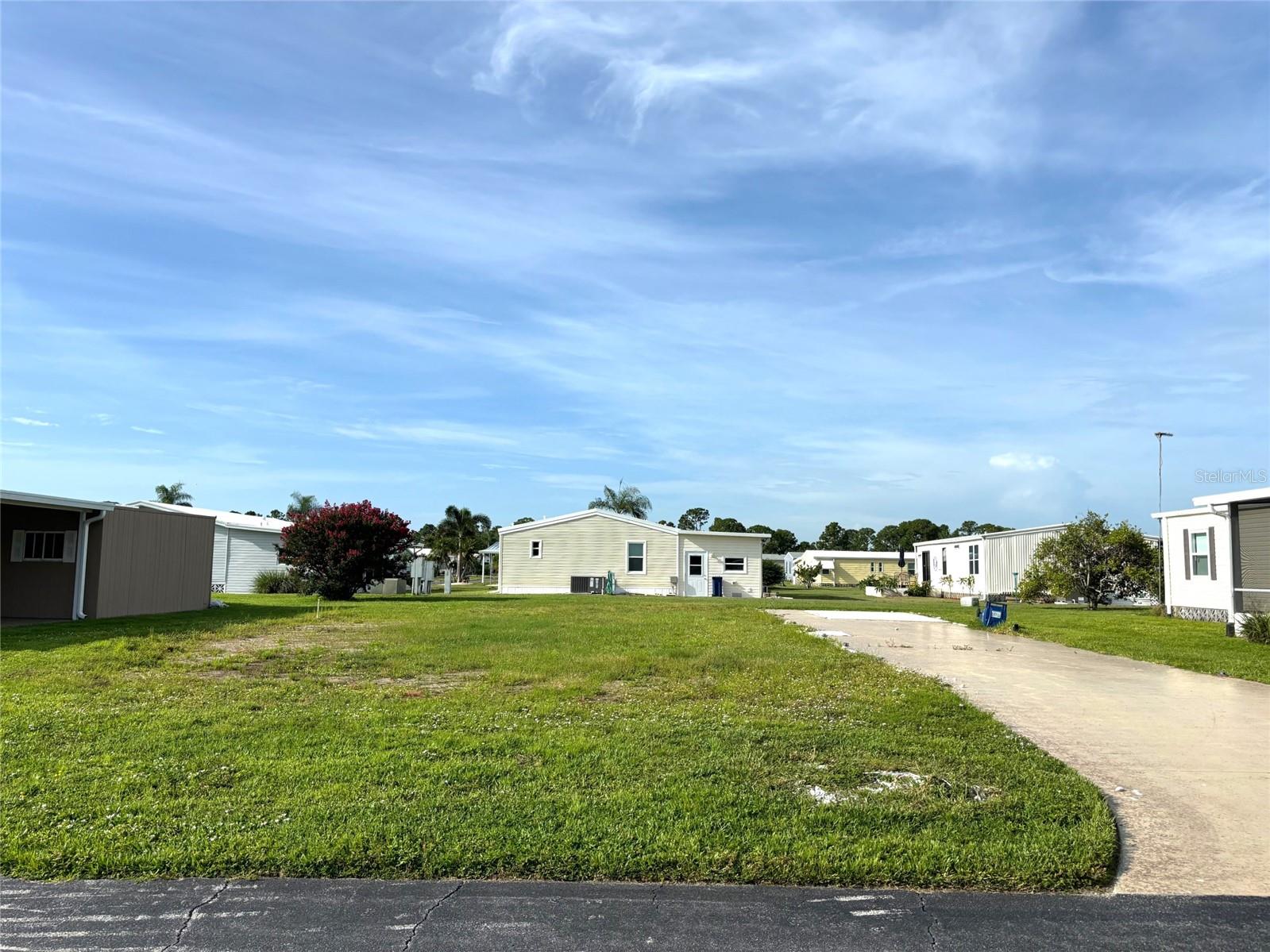 Large vacant lot with a beautiful view of Lake Hermoso. La Casa, a vibrant 55+ community, offers the ultimate Florida lifestyle. We have 974 homes nestled among a variety of native trees with spacious common grounds surrounding our eight lakes. Located between Sarasota and Fort Myers, this is a boater's dream with access to the Gulf of Mexico. It is convenient for shopping, sightseeing, golfing, fishing, and boating, as well as all the culture and elegance the Southwest Florida area is noted for. La Casa may have the best pools in the area. Our crown jewel is an extremely large, 40 X 60-foot swimming pool that is kept at a perfect 87 degrees. Our smaller 20 x 40 pool is quietly nestled between the clubhouse and the Activity Building. Both pools have adjacent hot tubs which are ideal for soaking muscles that are tired from golfing or tennis. Wireless Internet (Wi-Fi) is available at the Clubhouse, Activity Building, and Recreation Hall area where these pools & spas are located, so you can catch some rays while you catch up on your email! Sound enticing? Come for a visit to this self-contained oasis and see for yourself why La Casa is the ultimate destination for both snowbirds and year-round residents!
