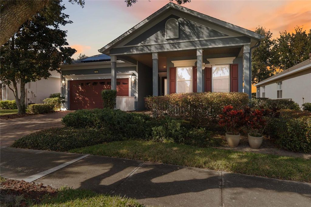 Photo of 129 Crepe Myrtle Drive, Groveland, FL 34736 (MLS # O6380289)