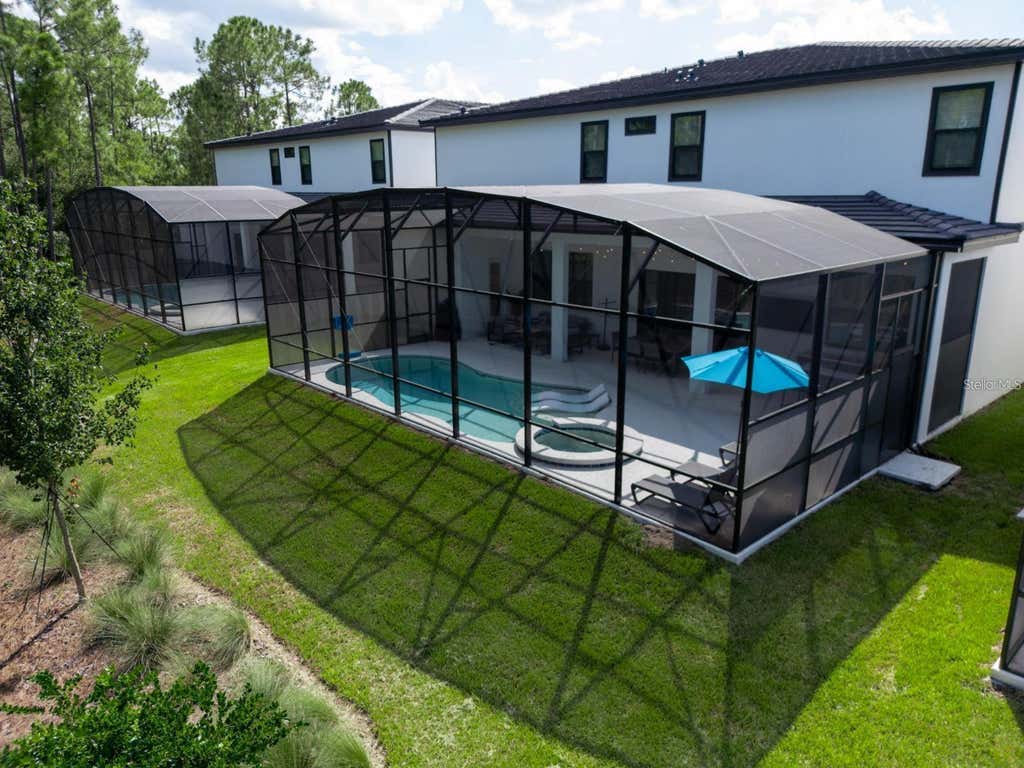 Photo of 1443 Butterfly Milkweed Court, Davenport, FL 33837 (MLS # O6434732)