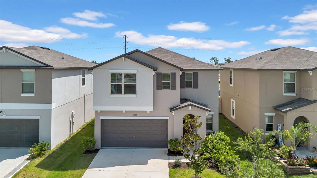 Photo of 31592 Barrel Wave Way, Wesley Chapel, FL 33545 (MLS # TB8424563)
