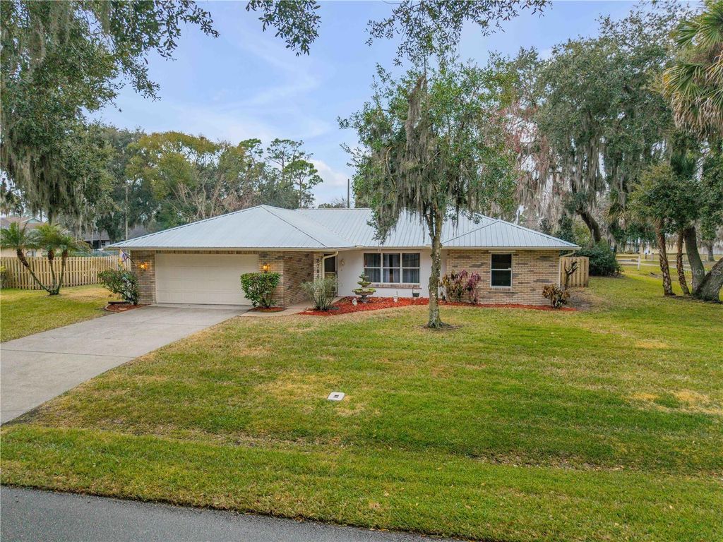 Photo of 2704 Orange Tree Drive, Edgewater, FL 32141 (MLS # NS1087253)