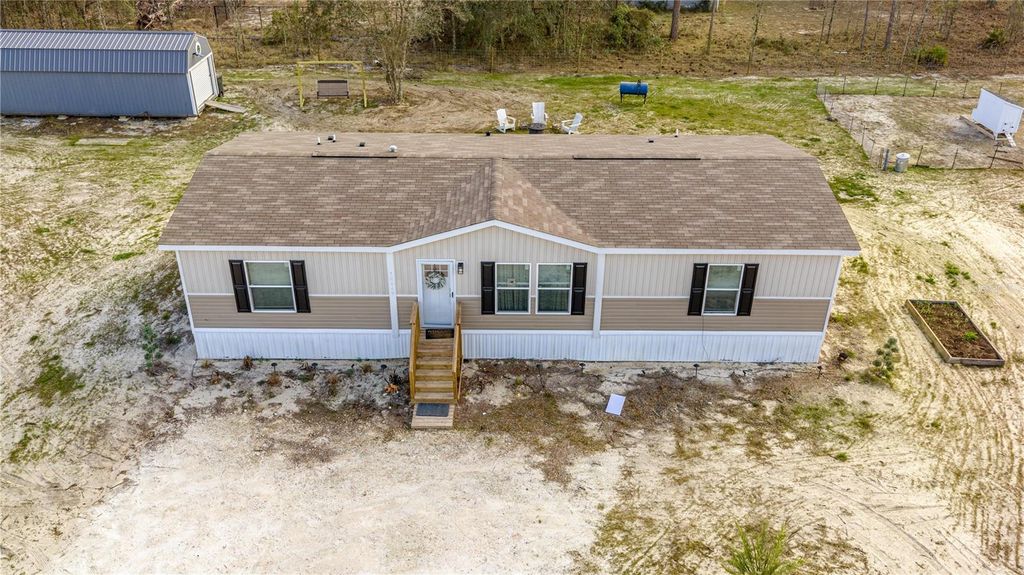 Photo of 14440 SE 21st Place, Morriston, FL 32668 (MLS # OM719815)