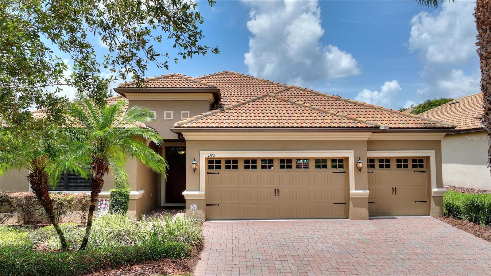 LIVE LIKE A CHAMPION! FULL GOLF MEMBERSHIP INCLUDED IN THE HOA! This beautifully maintained, 3-bedroom, 3-bathroom home with a flexible bonus room and 3-car garage is located in the highly desirable ChampionsGate Country Club. Situated just a short stroll from the neighborhood restaurant and resort-style pools, this home offers the perfect blend of comfort, convenience, and community living. Freshly painted and move-in ready, the open-concept floor plan features 18” tile throughout the main living areas, creating a clean and cohesive look. The large flex room provides endless options—ideal for a home office, gym, playroom, or guest space. The kitchen is a chef’s dream with granite countertops, stainless steel appliances, and ample cabinet space. The spacious primary suite includes dual vanities, a generous walk-in shower, and a large walk-in closet. Step outside to your extended rear lanai, the perfect space for relaxing or entertaining with added privacy and no direct view into neighboring homes. ChampionsGate residents enjoy access to unparalleled amenities via golf cart-friendly roads. The Oasis Club features a 14,000 sq. ft. clubhouse with a full-service restaurant, movie theater, fitness center, game room, tiki bar, lazy river, and private cabanas. Homeowners also enjoy The Plaza—an exclusive clubhouse with its own restaurant (and a $75 monthly food credit), bar, two pools, fitness center, game room, and pickleball courts. The recently opened Retreat Club offers a full waterpark and even more recreational space. The HOA covers full golf and tennis/pickleball privileges, access to all amenities, gated security, lawn maintenance, cable, internet, phone, trash collection, and security monitoring—delivering a true maintenance-free lifestyle. Located just minutes from Central Florida’s top attractions, championship golf, dining, and shopping, this home presents an exceptional opportunity in one of the area’s most sought-after communities. Schedule your private showing today!