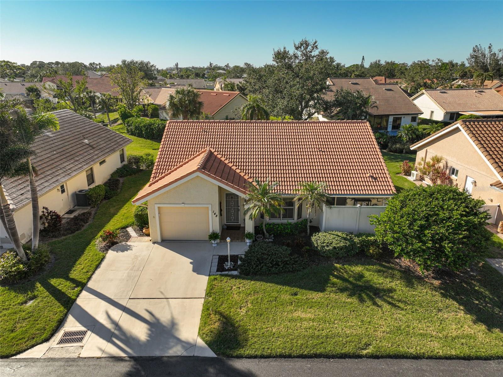 **TURNKEY FURNISHED, WEST OF TRAIL HOME SITUATED ON A QUIET AND TRANQUIL, INTERIOR LOT (NO FLOOD ZONE)** This 2-BEDROOM, 2-FULL BATH home includes a Stunning and Spacious BONUS Enclosed Lanai with an Additional ~320SF! Featuring Vaulted Ceilings, a Light and Bright Open Floorplan, well-equipped Kitchen with Granite Counters and White Cabinetry … PLUS an Expansive Primary Bedroom Suite with walk-in closet and Primary Bath with dual vanities and custom-tiled shower. 1-Car, Attached Garage. THE INLETS is a Highly Sought After, LOW MAINTENANCE, Amenity-rich, Gated Community offering an Active Lifestyle with its beautiful Clubhouse, Pool, Fitness, Tennis, Pickleball, Bocce and More! This ideal, West of Tamiami Trail location offers ease of access to I-75, area Beaches including #1-rated Siesta Beach, Shopping, Venice Island, Downtown Sarasota cultural venues, and all that Florida’s Gulf Coast Living has to offer. **MUST SEE!**