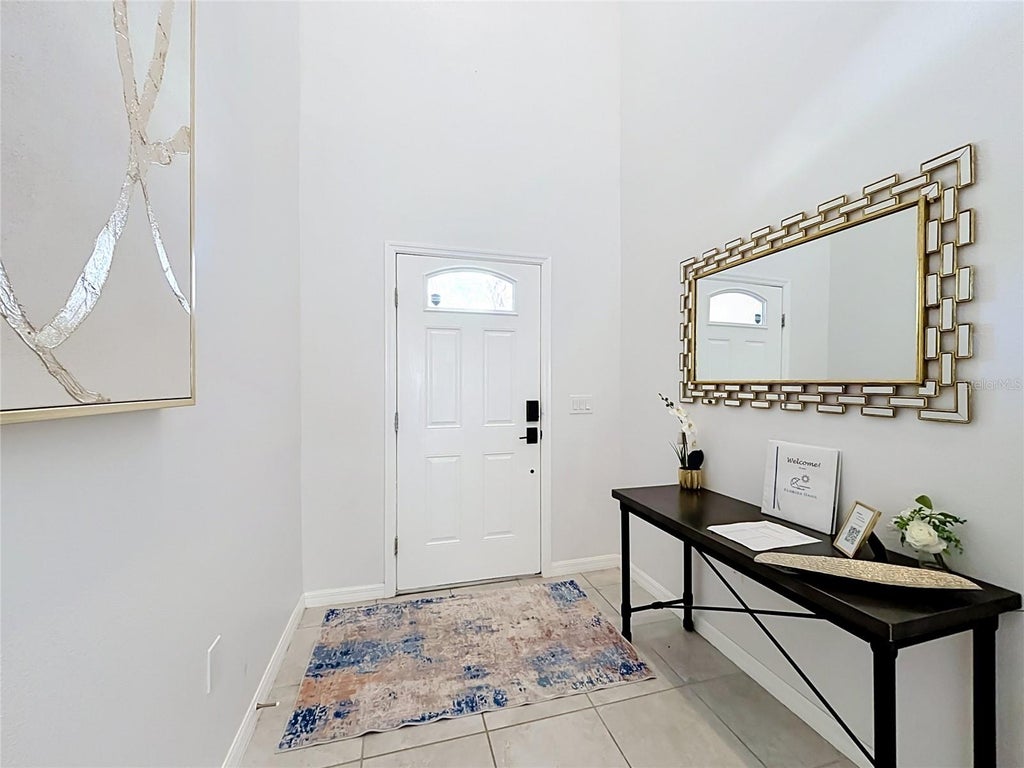 Photo of 8879 Qin Loop, Kissimmee, FL 34747 (MLS # O6443266)