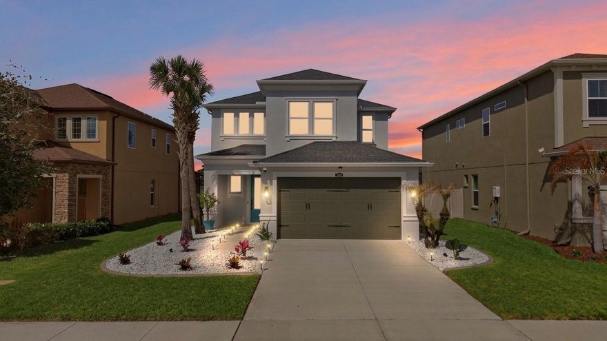 One or more photo(s) has been virtually staged. Welcome to luxury living in the highly desirable Estancia at Wiregrass community in Wesley Chapel. This beautifully updated two-story, 4 bedroom, 3 bathroom home with a 2-car garage and approximately 2,300 square feet offers the perfect blend of modern style, comfort, and scenic waterfront living. Situated on a premium lot overlooking a peaceful pond, this home provides stunning water views and tranquil sunsets from the large covered and screened-in lanai, creating the perfect space for relaxing or entertaining. Inside, the home features a bright open floor plan with abundant natural light, upgraded finishes, and modern design throughout. The spacious living area flows seamlessly into a fully upgraded kitchen featuring quartz countertops, stainless steel appliances, custom cabinetry, a large center island with breakfast bar seating, stylish backsplash, and a walk-in pantry, making it ideal for everyday living and hosting guests. The home also includes first-floor tile flooring, second-floor luxury vinyl plank flooring, and a beautiful hardwood staircase with iron spindles for a sleek, modern touch. The generously sized primary suite provides a peaceful retreat with water views, walk-in closet, and a luxurious ensuite bath, while additional bedrooms and bathrooms offer plenty of space for family, guests, or a home office. Additional upgrades include Nest smart thermostats, a reverse osmosis drinking water system, whole-home water filtration system, decorative landscaping with white river rock, and an upgraded screened lanai with ceiling fans. Located in the resort-style Estancia at Wiregrass community, residents enjoy exceptional amenities including a luxury pool with waterslide and lap lanes, clubhouse, fitness center, walking trails, playgrounds, sports courts, and more. Conveniently located near The Shops at Wiregrass, Tampa Premium Outlets, The Grove, major hospitals including Advent Health and BayCare, top-rated schools, dining, and easy access to I-75, this home offers both luxury and convenience in one of Wesley Chapel’s most sought-after communities.