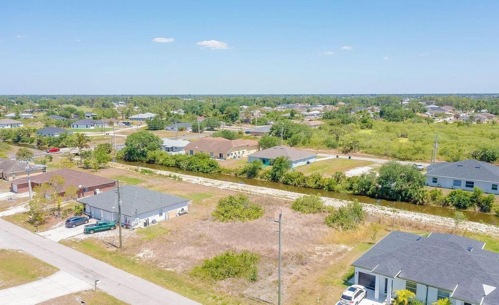 Photo of 2405 Ansel Avenue S, Lehigh Acres, FL 33973 (MLS # C7519830)