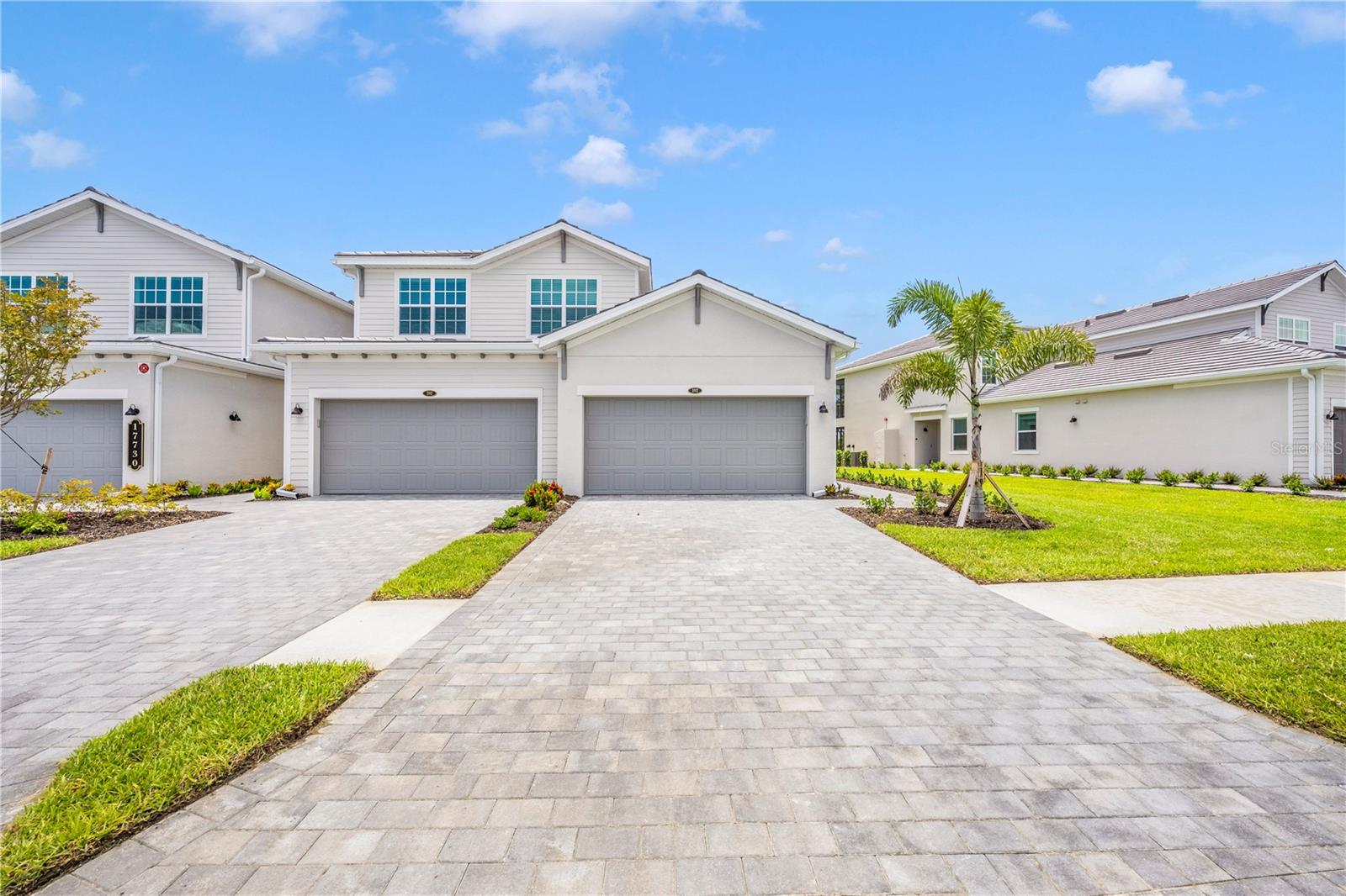 Be the first to live in this brand new 3 bed / 2 bath coach home located in a prestigious gated golf country club community in Wellen Park! This beautifully designed residence features an open floor plan with modern finishes, a spacious kitchen with quartz countertops and stainless steel appliances, and enormous breakfast bar. Enjoy the convenience of a 2-car garage, full size in-unit laundry, and a private screened-in lanai perfect for relaxing or entertaining. Primary suite has king bed and TV, large walk in closets and en suite bath with slider out to screened in porch. Second and Third bedrooms have queen beds with 2nd bath conveniently located outside of both. Large living and dining rooms with high end finishes and beautiful new furniture. Completely turnkey with everything you need to call this home. Community amenities include 18 hole golf. course, membership included, pickleball and tennis courts, bocci ball, clubhouse, dining, fitness center, spa, full time activities director, and resort-style pools. Available for monthly rental, perfect for seasonal or long-term stays. Close to several of Southwest Floridas amazing beaches, shoppings, tons of restaurants and nightly entertainment in downtown Wellen Park. Cool Today park is just down the street for Braves Spring Training. Lots of walking trails and ponds for fishing make this a great place for all of your entertainment needs. Call today to reserve your month!
