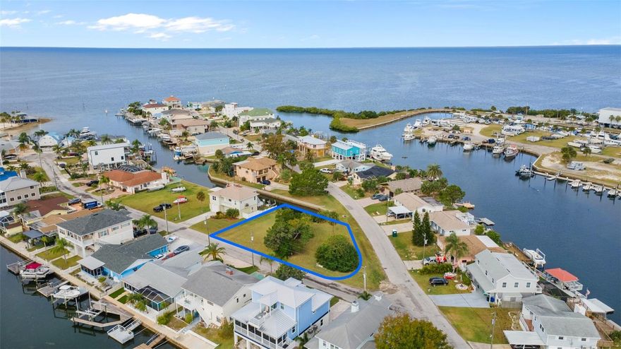 OVERSIZED, WATERFRONT LOT WITH GULF DIRECT ACCESS!! Build your DREAM home on this 0.28 acre vacant lot in Hudson Beach Estates. Corner Lot on a dead-end street with Public Water & Sewer!! Less than 5 minutes from US-19 for easy access to nearby cities, such as: New Port Richey, Tarpon Springs, Weeki Wachee, Homosassa, Spring Hill, Clearwater, and St Petersburg. Direct Gulf access with no bridges and Yvette Dr is right across the water from Hudson Beach. NO HOA!! Endless adventures await—whether you’re casting a line, soaking up the sun, searching for scallops, or taking in breathtaking sunsets. The generous lot sits on a canal, featuring 55 feet of seawall. Travel is easy with Tampa International Airport less than an hour away.
