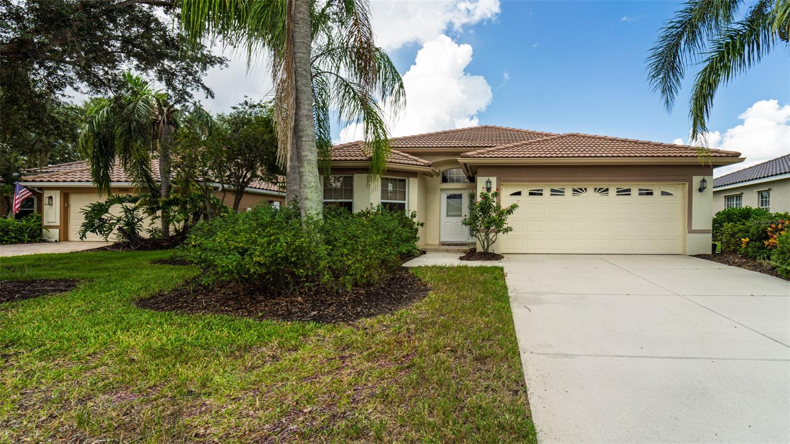 Beautifully remodeled 2 bedroom plus den maintenance free home in the quiet neighborhood of The Riverclub. Custom kitchen and bathrooms, hardwood floors and tile. Carpet in bedrooms. Newer A/C and kitchen appliances. New Front Door. Custom Blinds throughout Long lake views. Close to downtown Lakewood Ranch with NO CDD FEES!