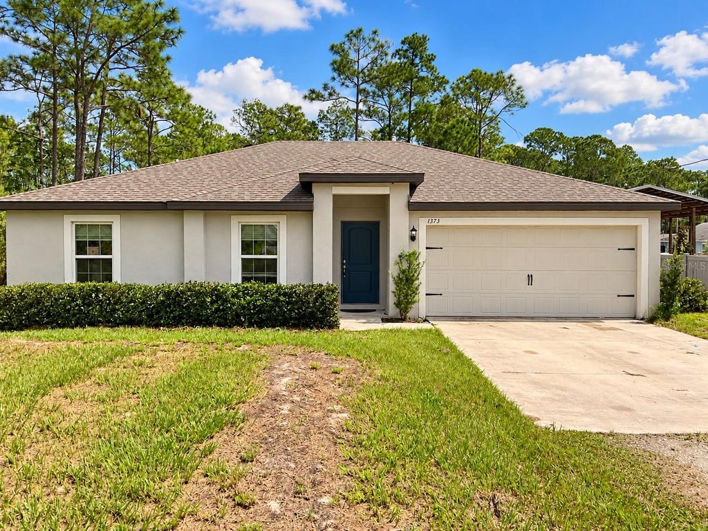 Photo of 1373 East Parkway, Deland, FL 32724 (MLS # O6447810)